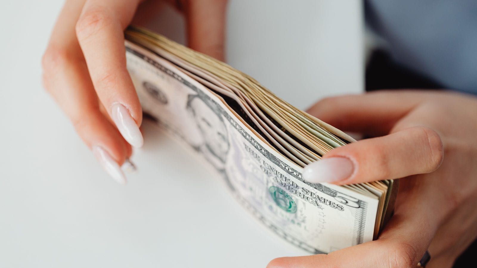 Monthly dividend ETFs explained: QQQI, SPYI and the safer SCHD