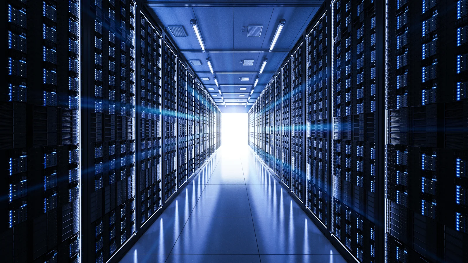 Rows of server racks lining a data center hall