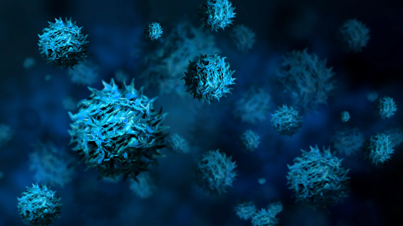 3D illustration of blue cancer cells against a dark background
