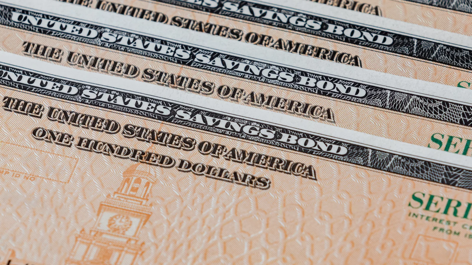 Rows of United States savings bond certificates